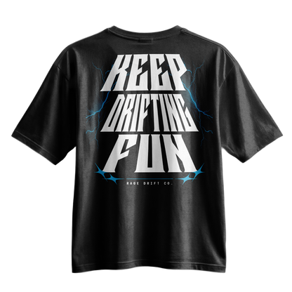 A black short-sleeve t-shirt with a large graphic on the back featuring the words 'KEEP DRIFTING FUN' in bold white letters with blue lightning accents, and 'RACE DRIFT CO.' printed below.